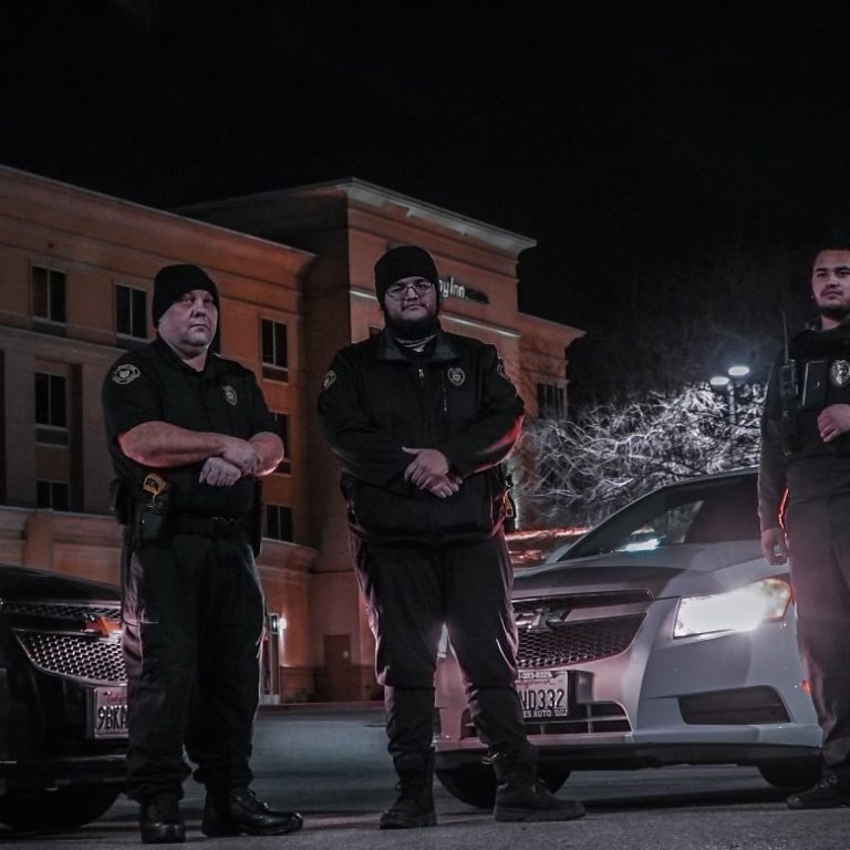 1-Twenty One Security night patrol team with marked security vehicles