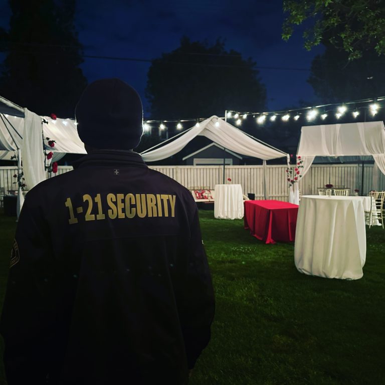 Uniformed 1-Twenty One Security officer providing event security